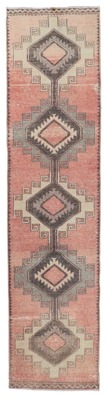 Full top view of the 3x13 vintage Anatolian runner rug with rose and gray geometric patterns.