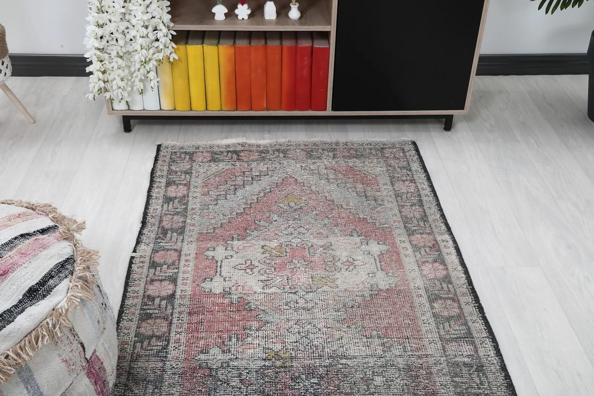Overhead angle of the runner rug, showcasing its length and placement in a room with shelving