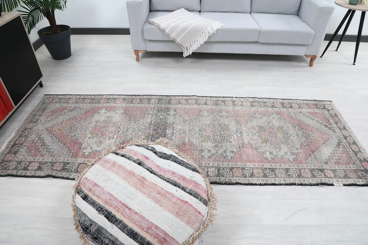 Wide shot of the runner rug from the front, showing its full length in a styled room