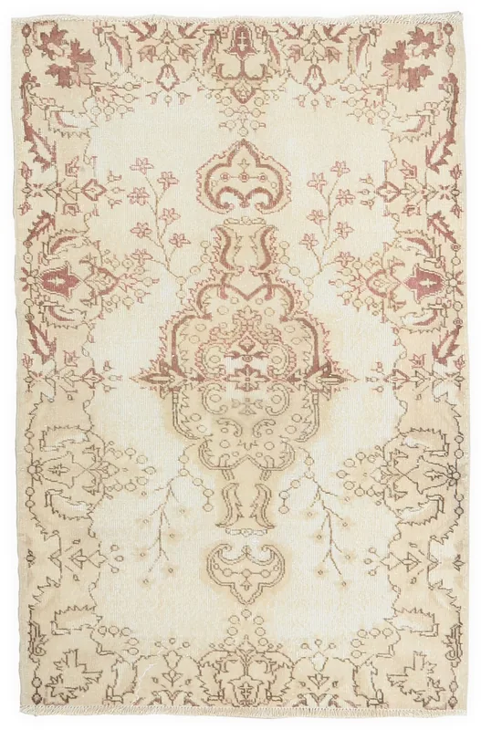 Full top view of the 3'10" x 5'10" ivory and rose vintage Anatolian rug