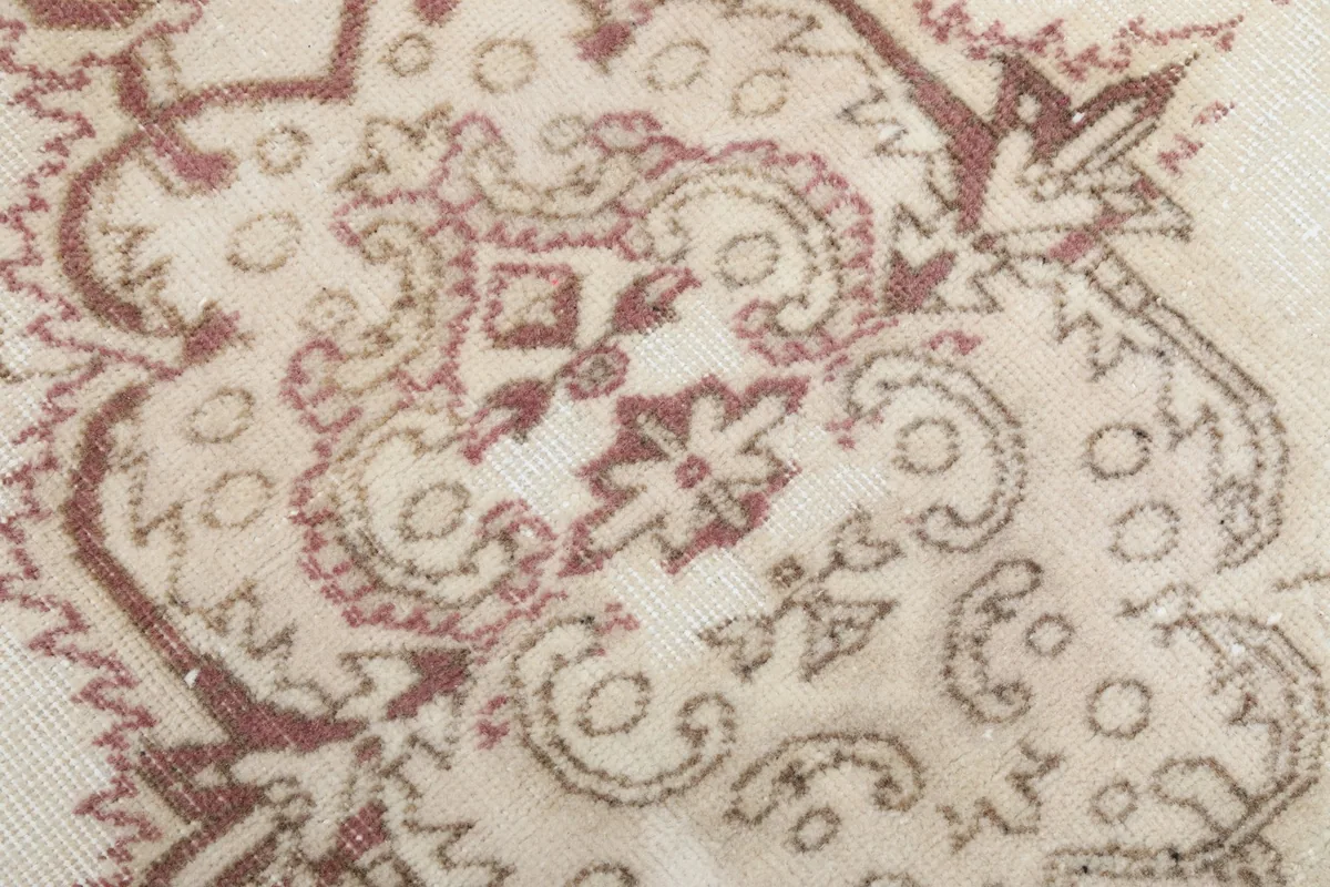 Detailed view of the low wool pile, showing texture and color variation