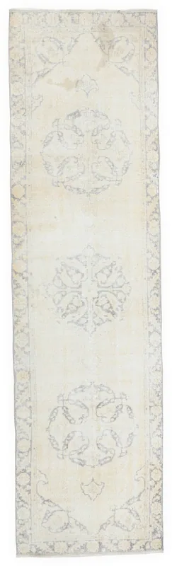 Full overhead view of the 2'11" x 11'5" ivory and gray vintage Anatolian runner rug
