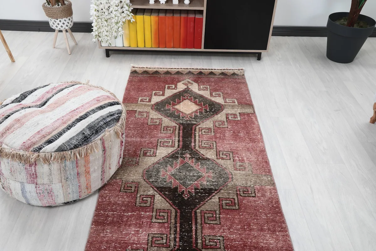 Overhead view of the vintage runner in a room, showcasing its length and pattern flow.