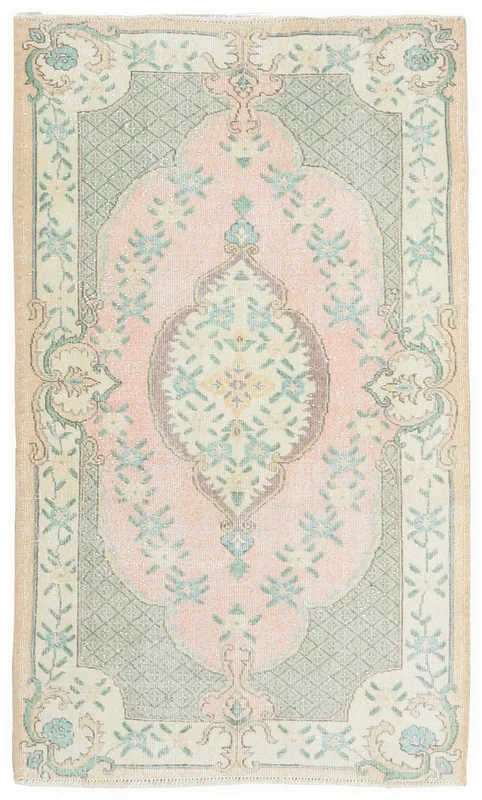 Full top view of the 4x6 rose and green vintage Anatolian area rug on a white background