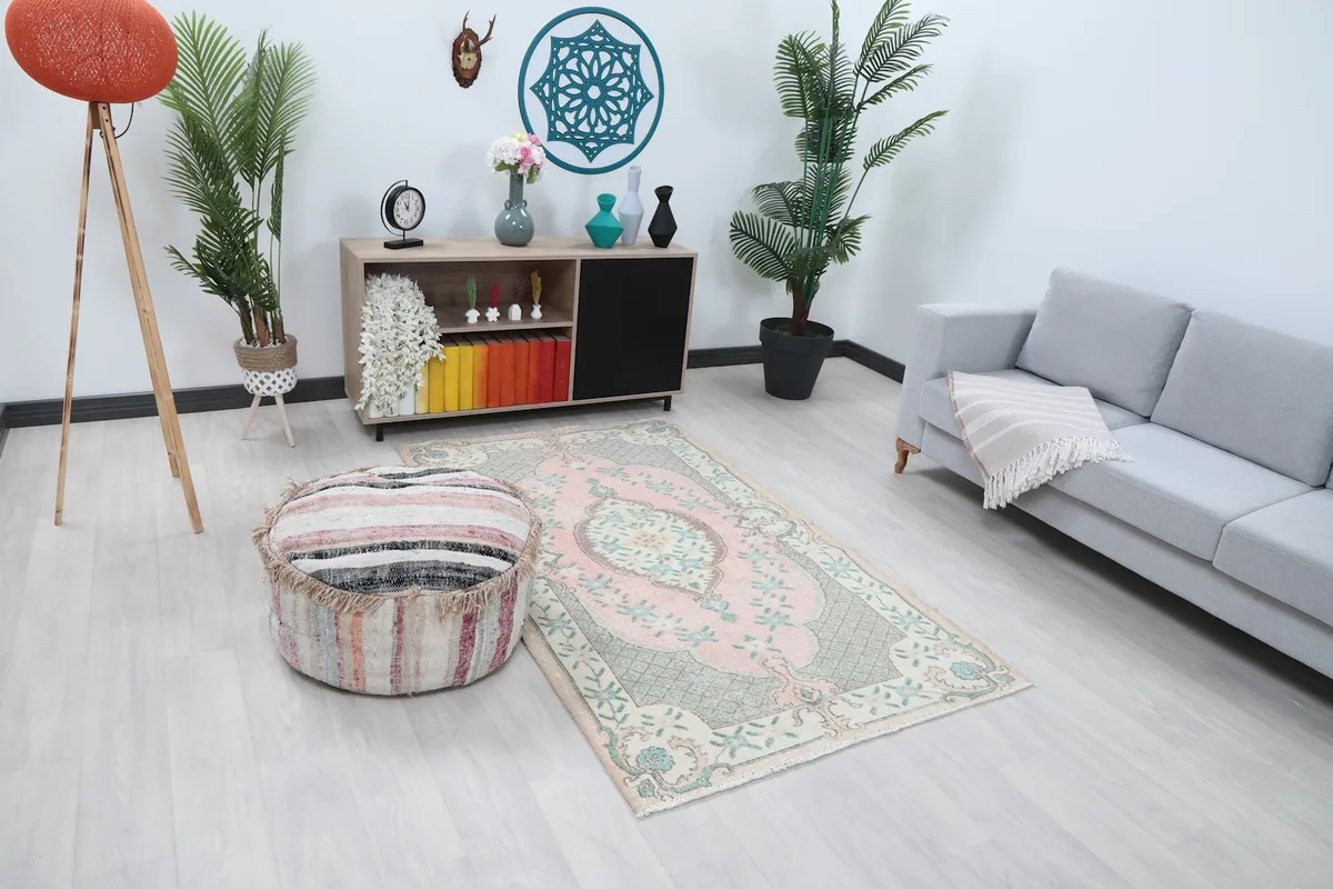 Overhead view of the rose floral rug in a room, showing its placement relative to furniture