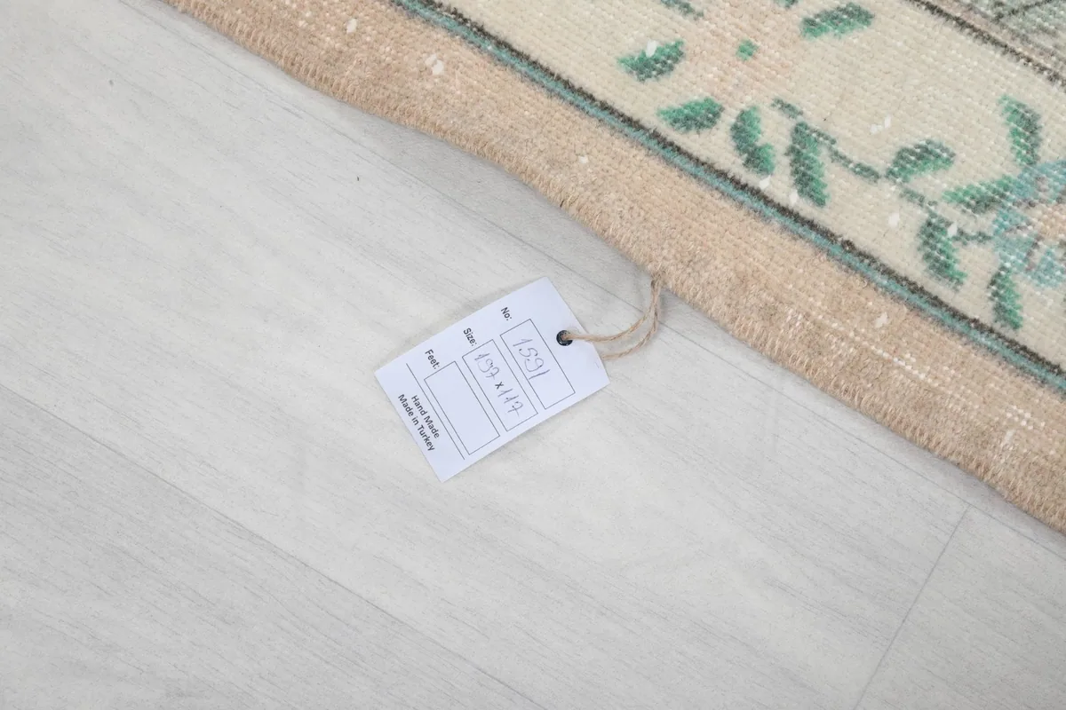 Rug tag displaying product information and origin details on the reverse side of the rug