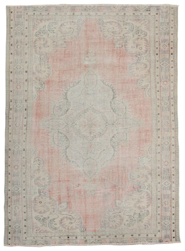 Full top view of the 8x11 vintage Anatolian rug with a rose field and central medallion
