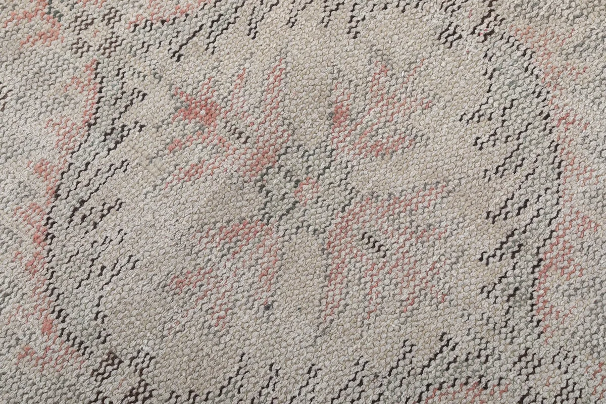 Texture of the low wool pile in the central medallion area of the rug