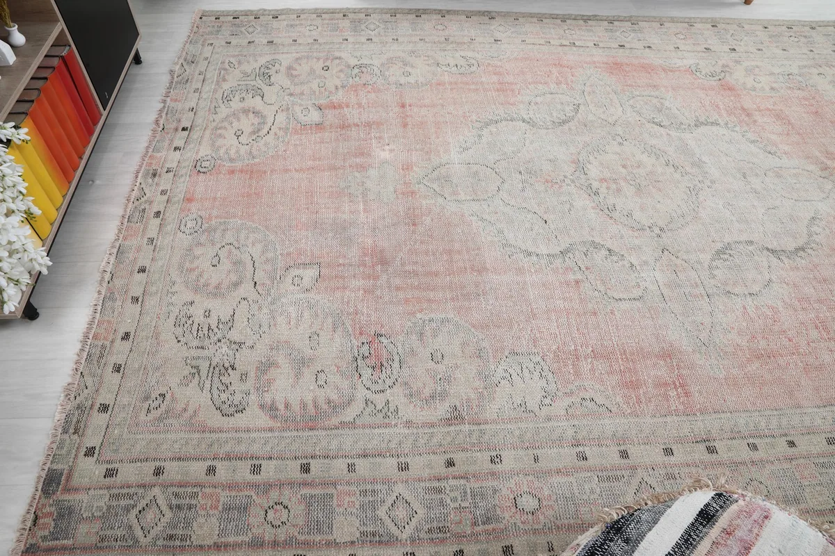 Overhead perspective of the large area rug, emphasizing its intricate medallion and border