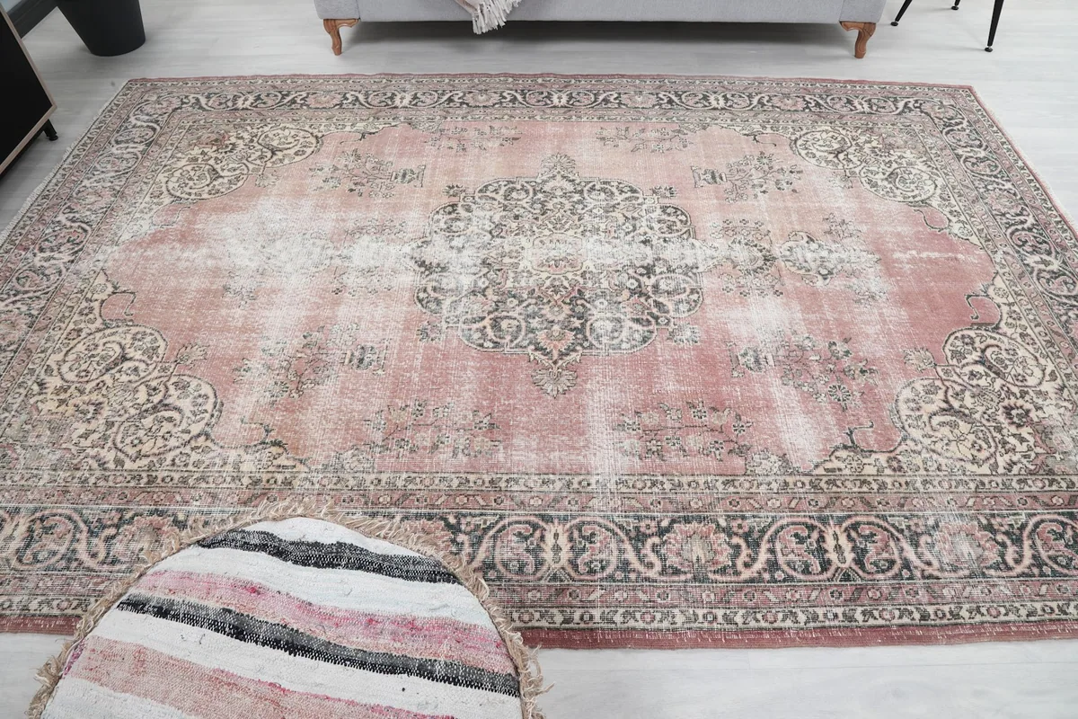 Overhead perspective of the entire rose medallion rug, showing its full design and dimensions