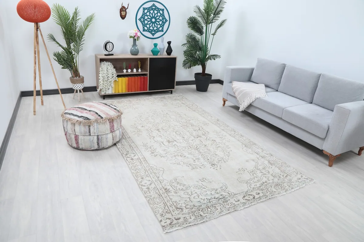 Angled view of the vintage Anatolian rug in a living space, showing its full length