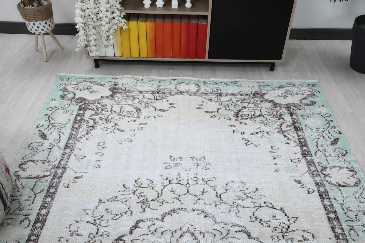 Overhead view of the rug in a room, highlighting its placement and size