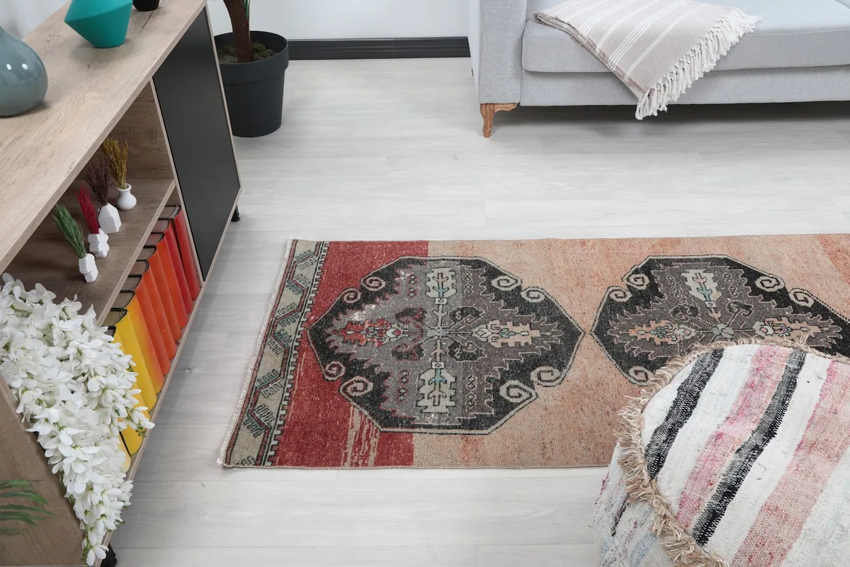 Angled view of the runner rug's upper section in the room, showing its placement