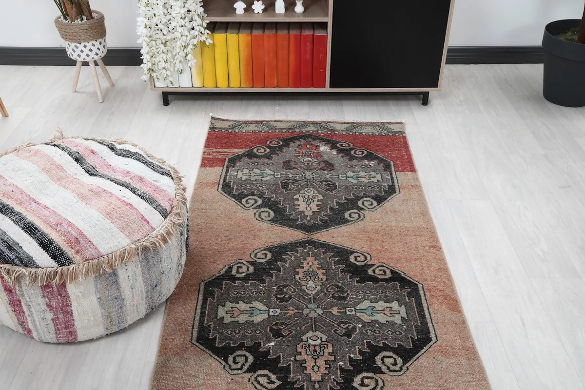 View of the runner rug from a different angle in the living room, showing the top half