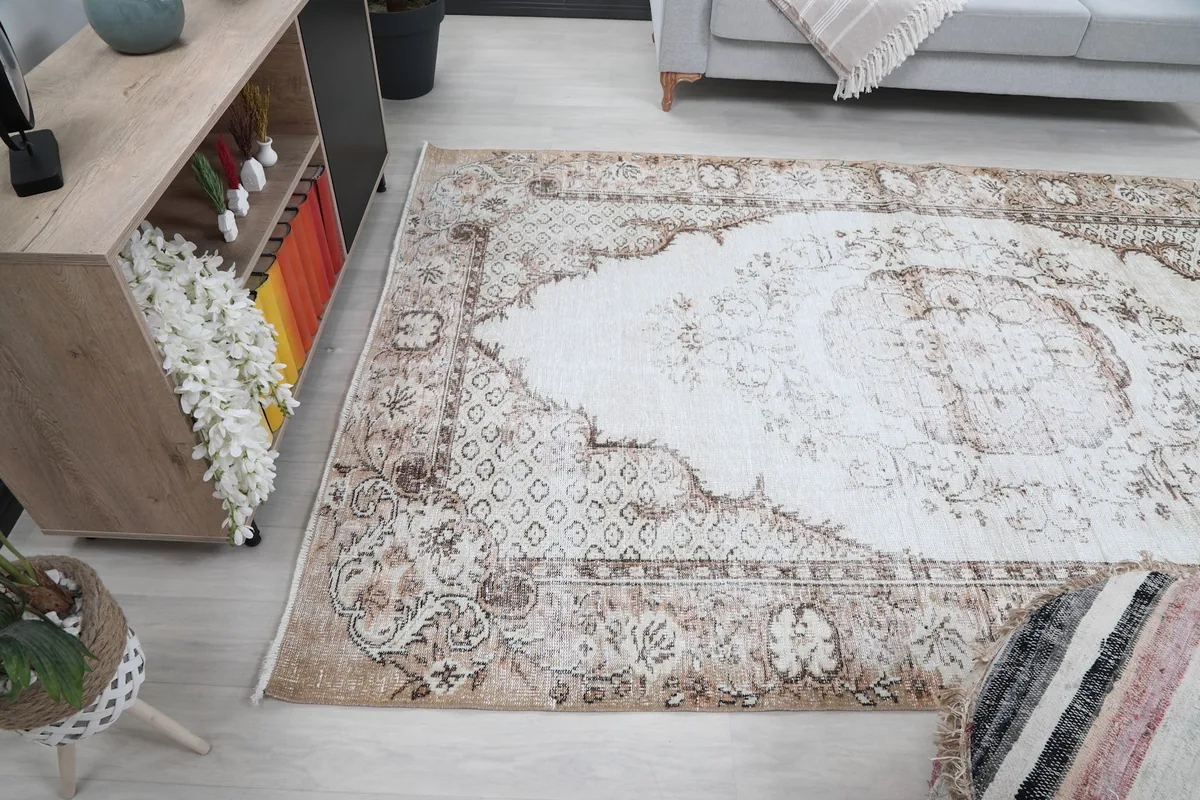 Wide angled view of the rug in a living room, displaying its full length and how it anchors the space.