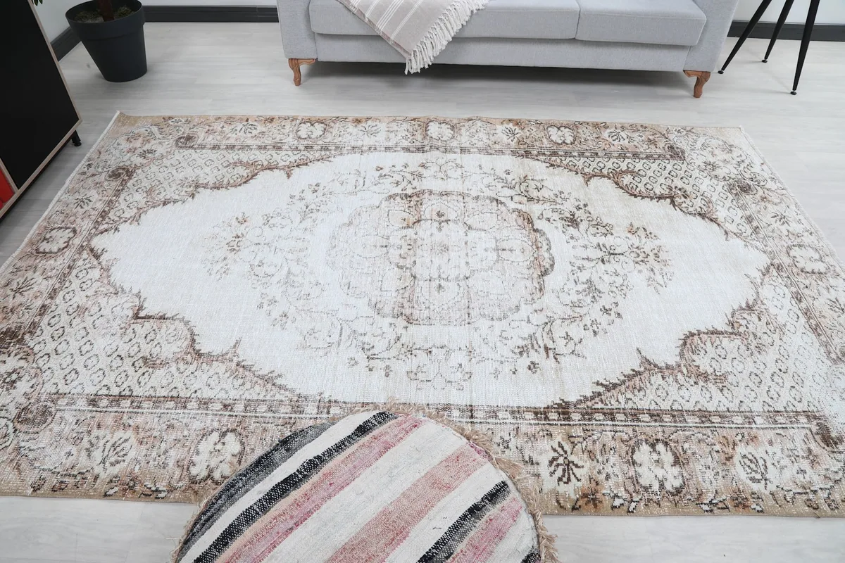 Overhead view of the rug in a living room, providing a full perspective of its design and size within the room.