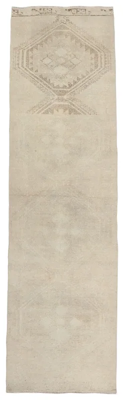 Full overhead view of the beige geometric Anatolian runner rug