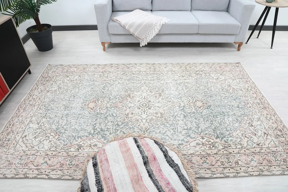 Wider room view of the rug, emphasizing its medium size and placement in the space.