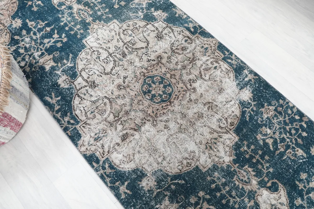 Top-down close-up of the central medallion and surrounding patterns on the runner