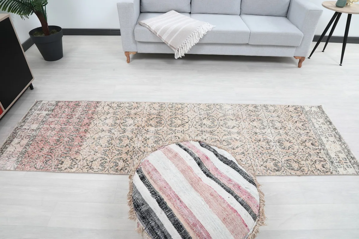 Overhead view of the entire runner rug, showcasing its full design and proportions in a room setting.
