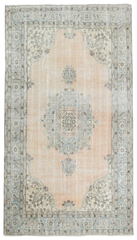 Full top view of the 6'9" x 10'2" orange vintage Anatolian rug on a white background.