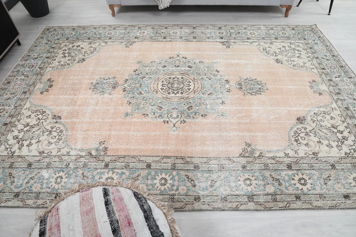 Full overhead view of the rug, emphasizing the central medallion and the overall color balance.