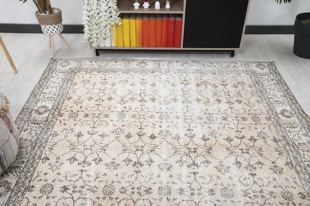 View of the rug in a room, focusing on its integration with a cabinet and decor