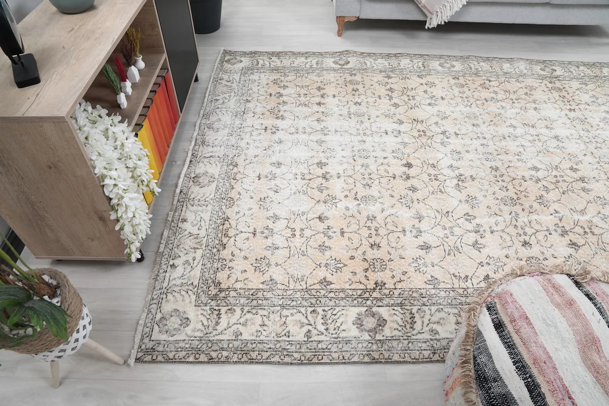 Wide angle view of the rug complementing a neutral-toned living space