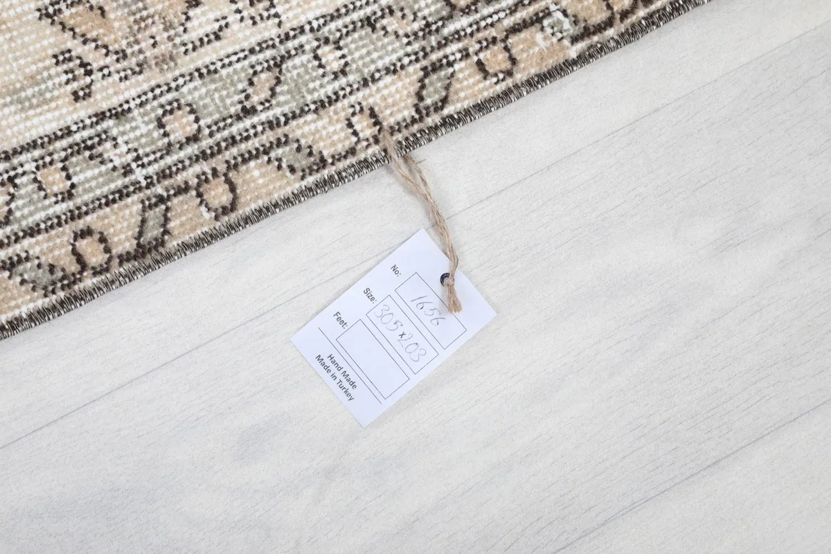 Product tag attached to the rug, displaying item information