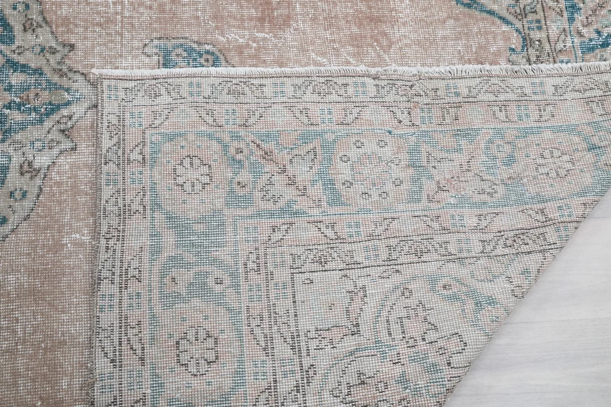 Close-up of the rug's reverse side, showing the dense knotting and craftsmanship