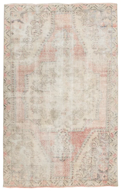 Full overhead view of the beige and rose vintage Anatolian area rug