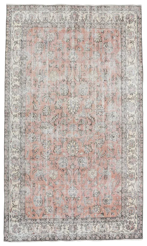 Full top view of the 6'8" x 10'0" vintage rose floral Anatolian area rug