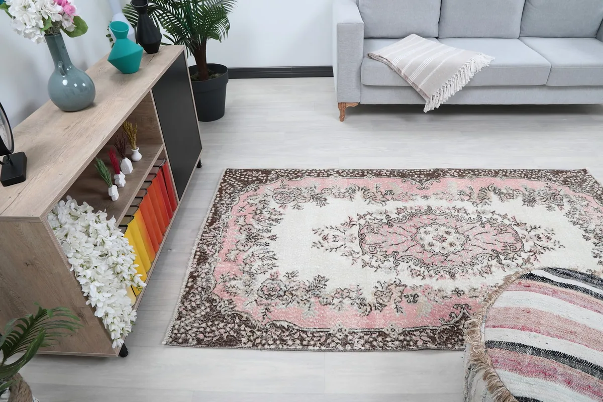 Wide shot of the rug in a living room, illustrating its size and how it complements the decor