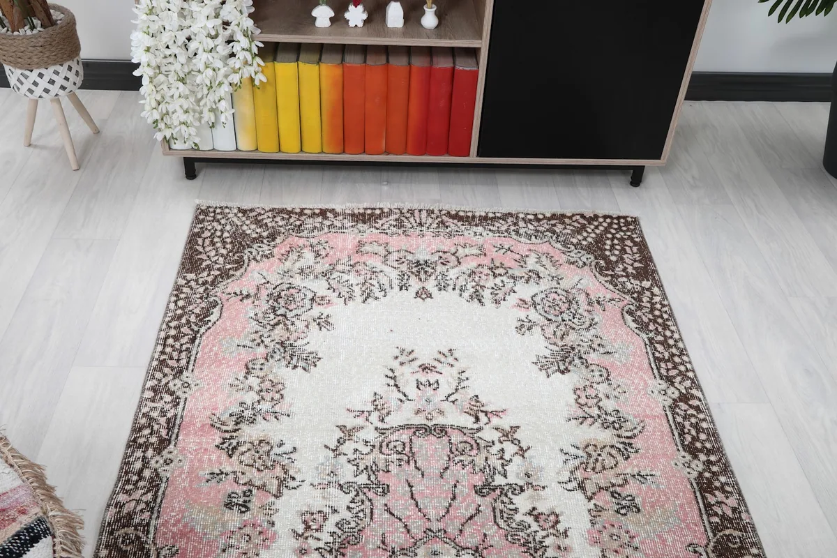 Overhead view of the rug showcasing its full design and the gentle patina on the wool pile
