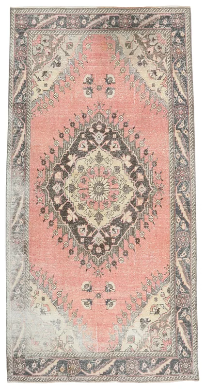Full top view of the vintage rose and charcoal medallion area rug on a white background