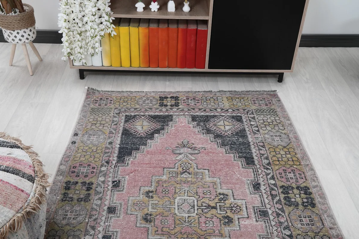 Another angle of the rug in a room, highlighting the full design and colors