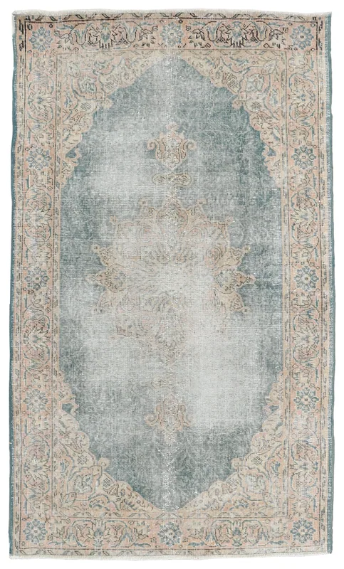 Full top view of the blue and beige vintage Anatolian rug
