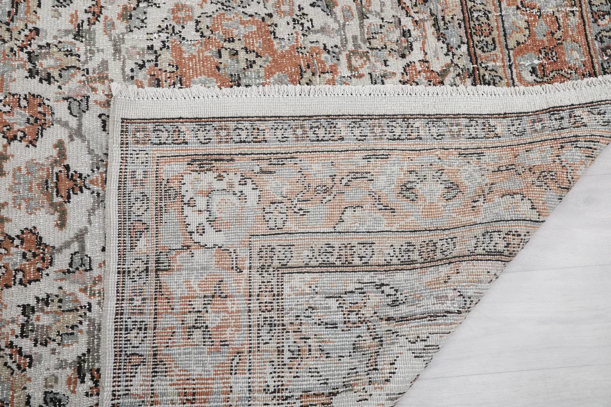 Cream Orange Floral Anatolian Rug close-up of the fringe and edge, showing craftsmanship.