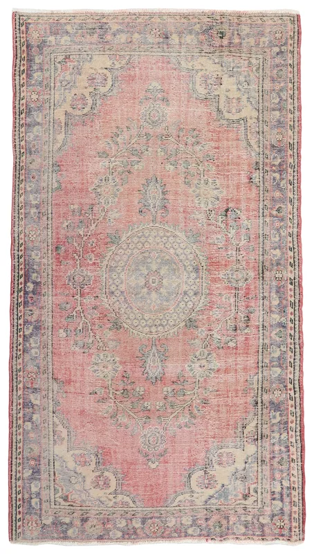 Full top view of the vintage Anatolian rose and beige medallion area rug