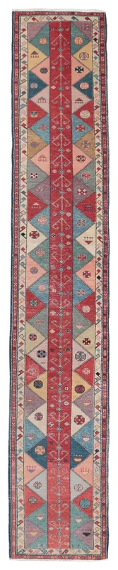 Full overhead view of the Red Tribal Motif Anatolian Runner rug with geometric patterns