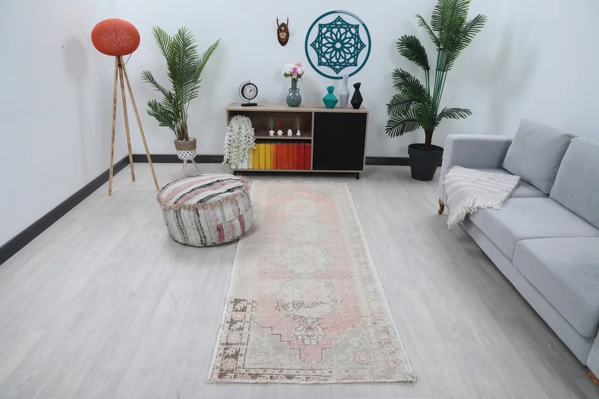Runner rug displayed in a modern living space, showing its size and color in context.