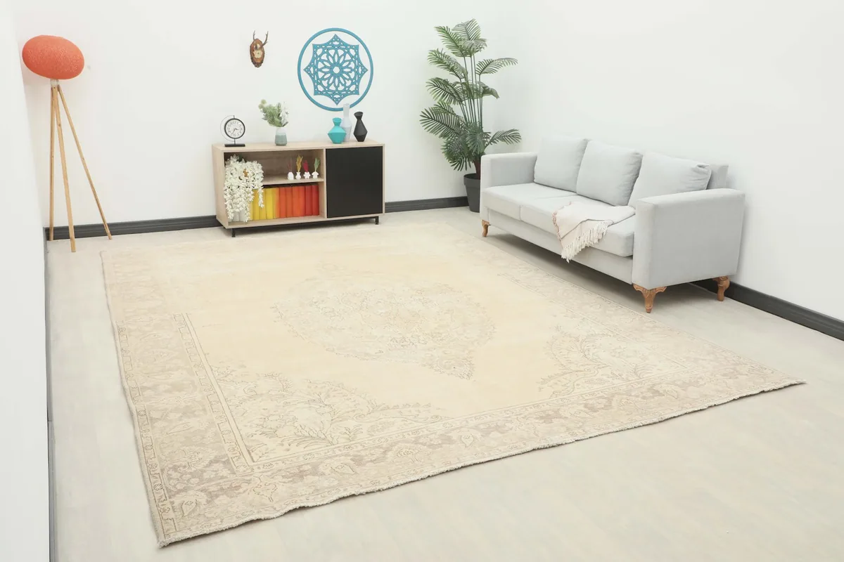 Another room view of the oversized ivory rug, displaying its integration into a modern living space.