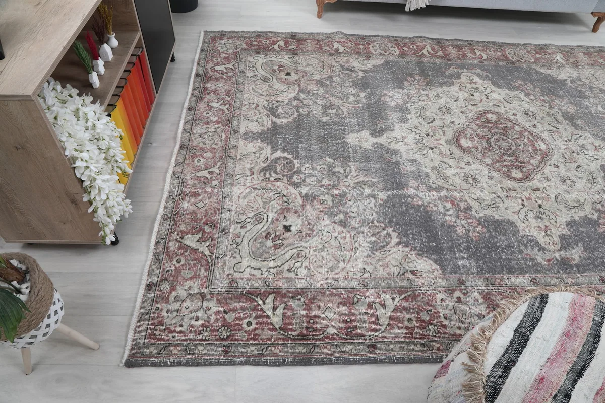 Another angle of the large vintage rug in a contemporary room setting