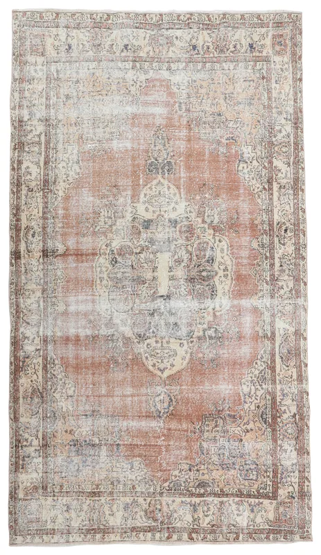 Full overhead view of the rust and ivory vintage Anatolian area rug