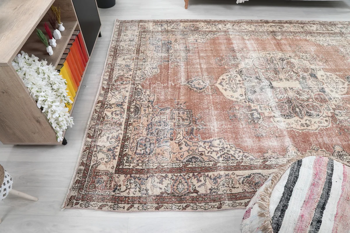 Rug placed in a room, viewed from a different angle, showing its scale