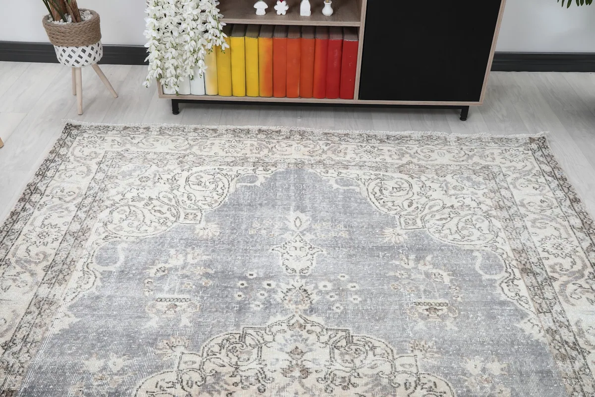 View of the rug in a room setting from the opposite end, showing its full length.
