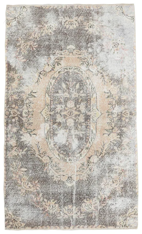Full overhead view of the hand-knotted charcoal and beige vintage Anatolian rug