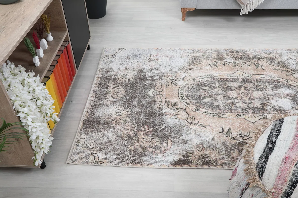 Room view from an elevated angle, showing the full length of the vintage rug