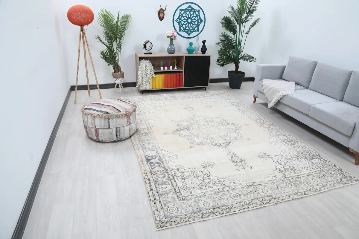 Overhead view of the ivory and charcoal vintage rug in a modern living space.