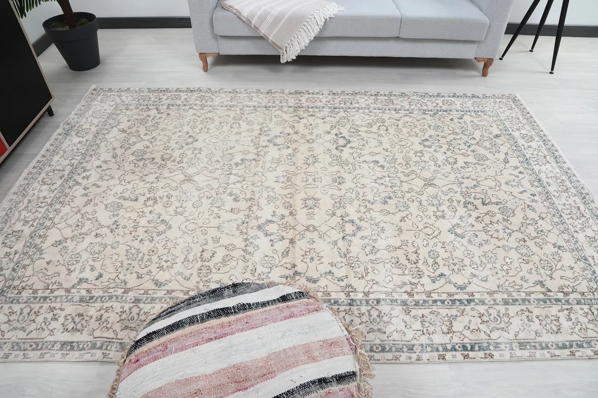 Frontal view of the rug in a room, emphasizing its full size and design